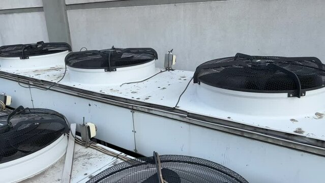 Heating, ventilation and air conditioning systems installed on a rooftop. Side view