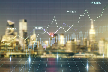 Abstract virtual financial graph hologram on blurry skyscrapers background, financial and trading concept. Multiexposure