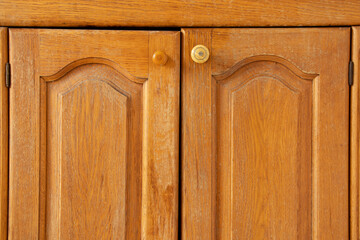 Old kitchen wooden brown cabinet as background ,kitchen furniture