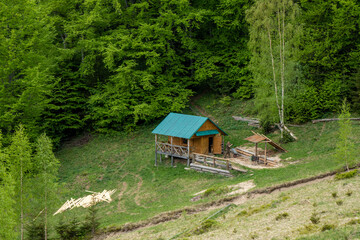 Aerial view of the hunter house in the middle of the forest.