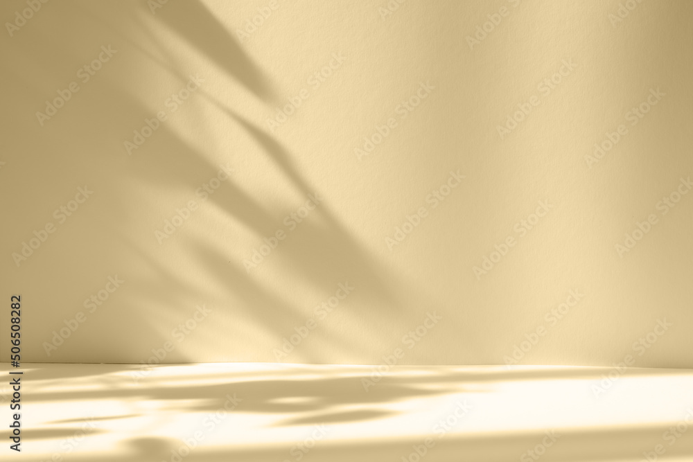 Poster Abstract beige studio background for product presentation. Empty room with shadows of window and flowers and palm leaves . 3d room with copy space. Summer concert. Blurred backdrop.