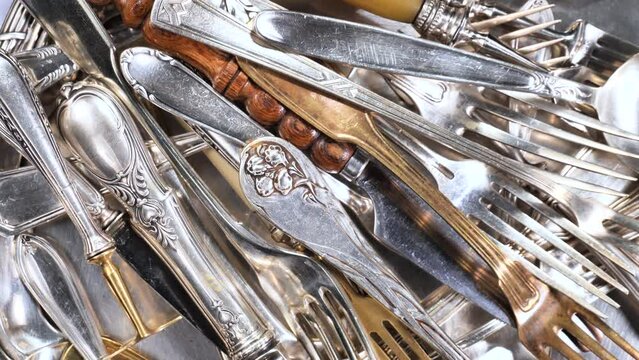 Silver old crockery on old background