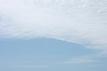 background or texture of light blue sky with clouds