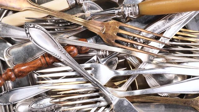 Silver old crockery on old background