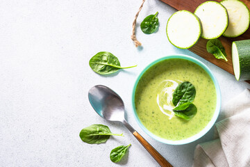 Green soup. Zucchini, spinach cream soup with cream.