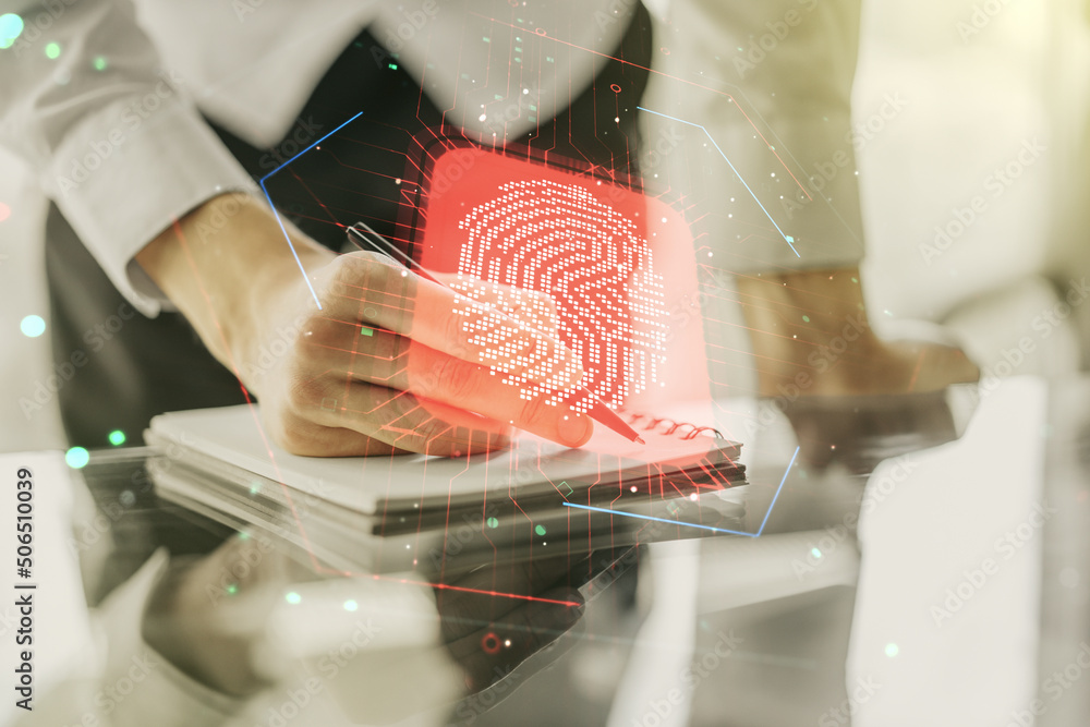 Aufkleber Multi exposure of creative fingerprint hologram with man hand writing in notebook on background, personal biometric data concept