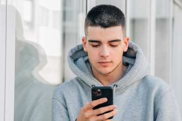 teen boy with mobile phone