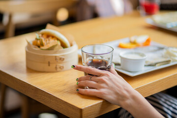person holding a cup of coffee