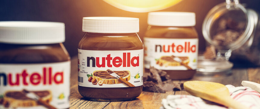 Pot of Nutella, the popular brand name of a sweetened hazelnut cocoa spread, introduced to the market in 1964 by Italian company Ferrero who celebrates 75 years anniversary in 2021