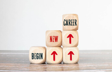 Starting a new beginning concept. The word new beginning on wooden cubes with a start button on...