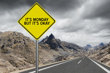 It's Monday but it's Okay quote on sign.