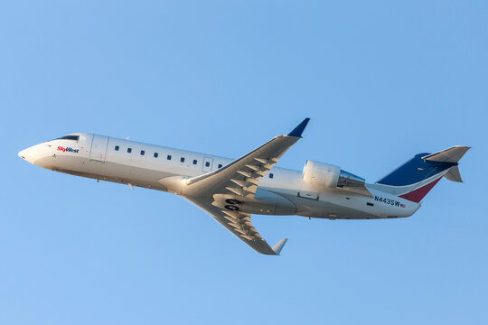Los Angeles, California, USA - March 10, 2010: SkyWest Airlines Bombardier CL-600 regional commuter jet taking off from Los Angeles International Airport.