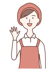 A female clerk greets a customer by raising her right hand