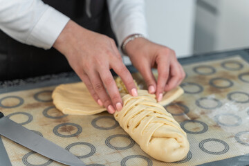 chef making a pie in the kitchen