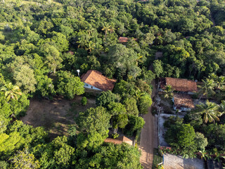 Fototapeta na wymiar Small village in the middle of nature, Mata Atlantica, Bahia, Brazil - aerial drone view