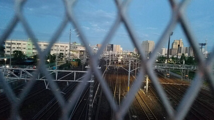 sunrise ovet Tokyo train yards