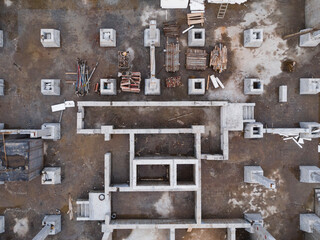 View of the construction site. Construction of the foundation of the building has begun. Aerial view.
