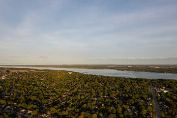 Simco lake centennial beach during sunset in the summertime blue skies