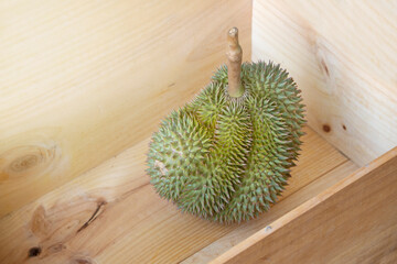 Durian stored in a wooden box - 506540608