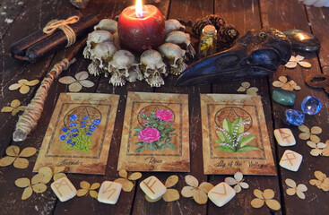 Wicca, esoteric and occult still life with vintage magic objects and tarot cards on witch table altar for mystic rituals and fortune telling. Halloween and gothic concept