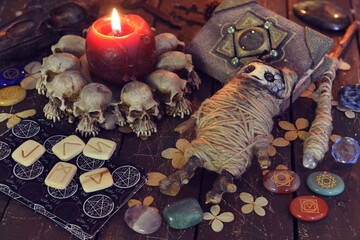 Wicca, esoteric and occult still life with vintage magic objects and voodoo doll on witch table altar for mystic rituals and fortune telling. Halloween and gothic concept - obrazy, fototapety, plakaty