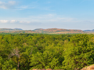 Fototapeta na wymiar Sunny view of the landscape around Wichita Mountains Wildlife Refuge