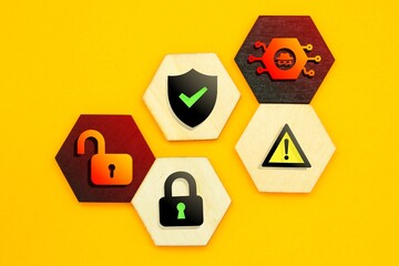 hexagon with cyber robber icons, caution and unlock. safety and security. security in cyberspace