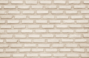 Cream and white brick wall texture background. Brickwork and stonework flooring backdrop interior