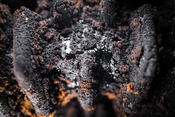 Tar and soot in the furnace of a solid fuel boiler after the heating season close-up