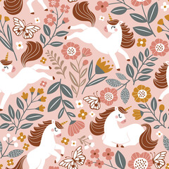 Seamless vector pattern with cute unicorns on floral background. Perfect for textile, wallpaper or print design.  © MirabellePrint