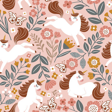 Seamless vector pattern with cute unicorns on floral background. Perfect for textile, wallpaper or print design. 