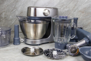 Modern kitchen machine with different attachments and accessories