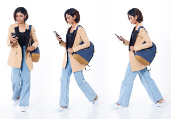 Full length of Asian Indian 20s working woman with curl hair hold cell smart phone backpack blazzer