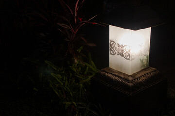 garden decoration lamp shining light at night