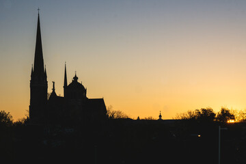Fototapeta na wymiar Silhouette of the Longueuil Cathedral at sunrise in Quebec, Canada