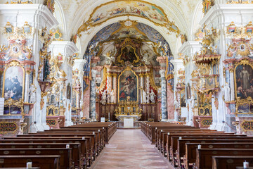 Fototapeta na wymiar Interior of the church St. Georg and Pankratius (Raitenhaslach). With numerous baroque ornaments.
