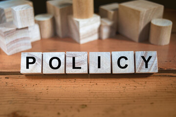 Policy Word Written In Wooden Cube