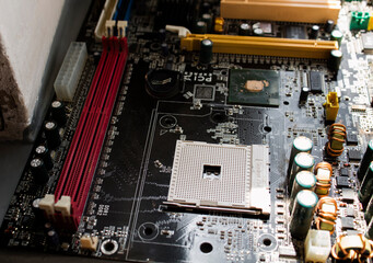 An old motherboard. Inside details of the old personal computer. Socket 754.