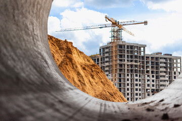 Insulated pipe. Large metal pipes with a plastic sheath laid in a trench. Modern pipeline for...