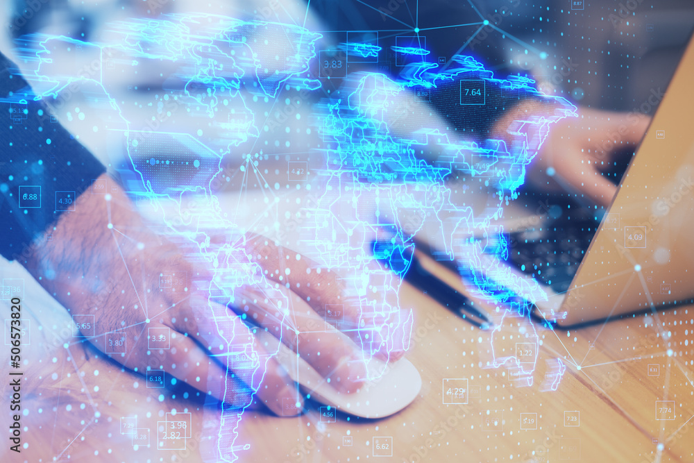 Aufkleber close up of hands using laptop and mouse with glowing blue map hologram and digital data concept on 