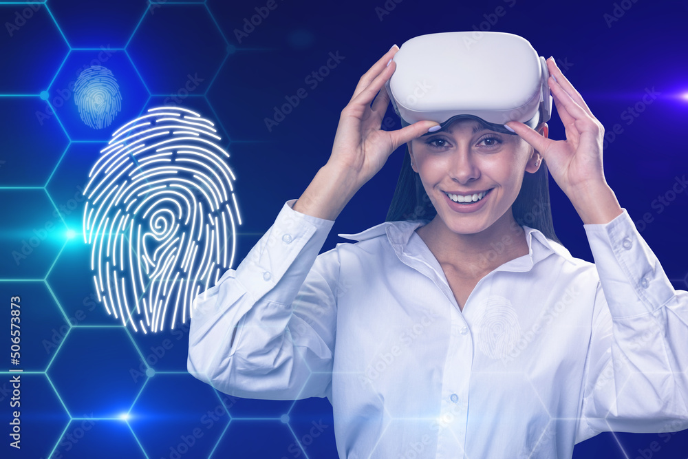 Poster attractive happy young european businessman with vr glasses on blue background with digital thumb pr