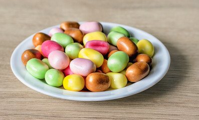 a bunch of chewing candies with a sparkling filling on a plate