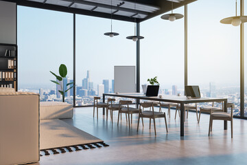 Modern loft office interior with furniture, equipment and panoramic city view with daylight. 3D Rendering.