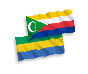 Flags of Union of the Comoros and Gabon on a white background