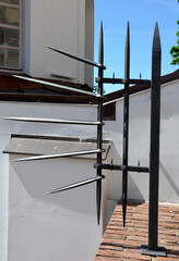 Balustrade at the castle in the autumn sun. the grille ending the end of the wall was protected...