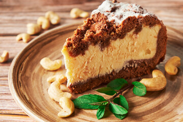 Plate with a piece of delicious homemade chocolate curd cake on the table