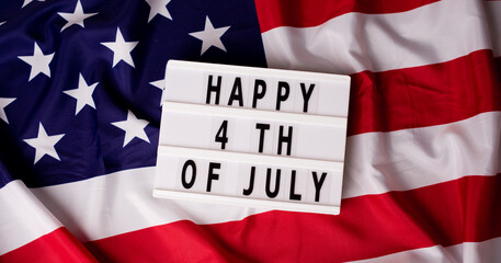Fototapeta na wymiar Text Happy 4th of July and Flag of United States of America for the freedom holidays