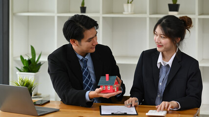 Business partners considering construction investment, joint venture business. Real estate concept