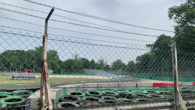 Racing car drifting on speed track, professional driver drifting car on track with smoke on Circuit