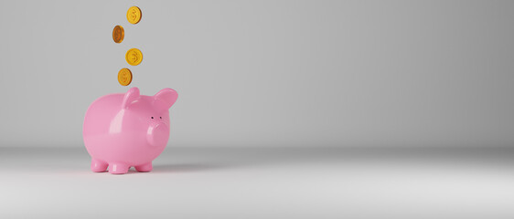 Falling coins with a pink piggy bank on a grey wall